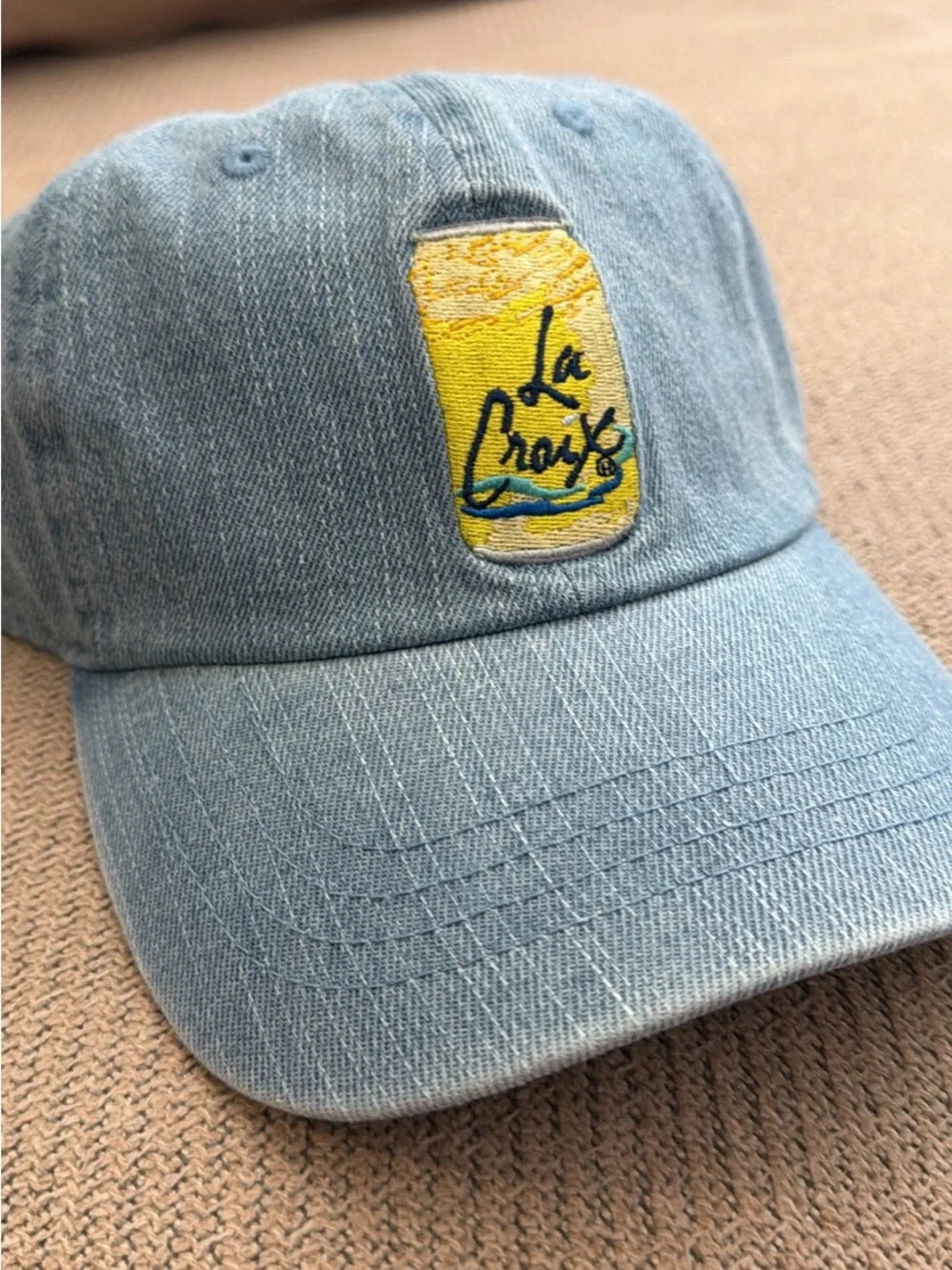 Light Blue Denim unisex Baseball Cap with Yellow La Croix logo
